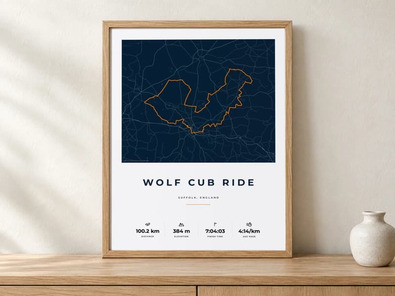 Wolf Cub cycling route print displayed in an oak frame