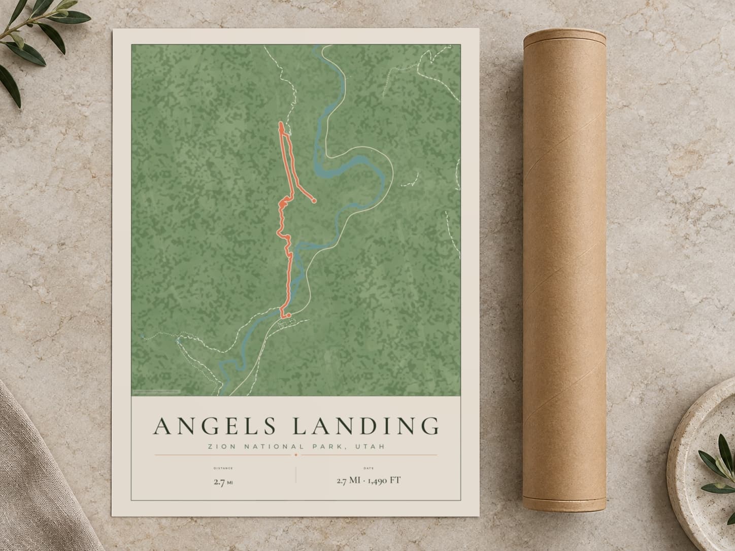 Cardboard postal tube beside a flat Angels Landing route print