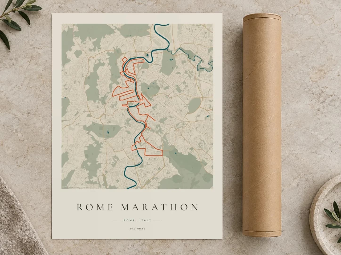 Cardboard postal tube beside a flat Rome Marathon route print