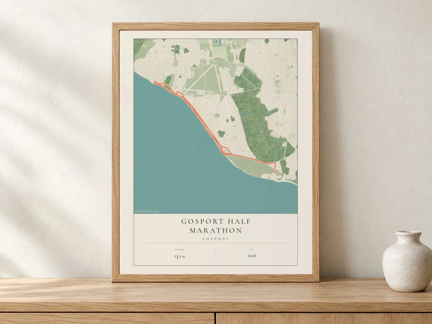 Gosport Half Marathon Parkland route print in a light oak frame on a sideboard