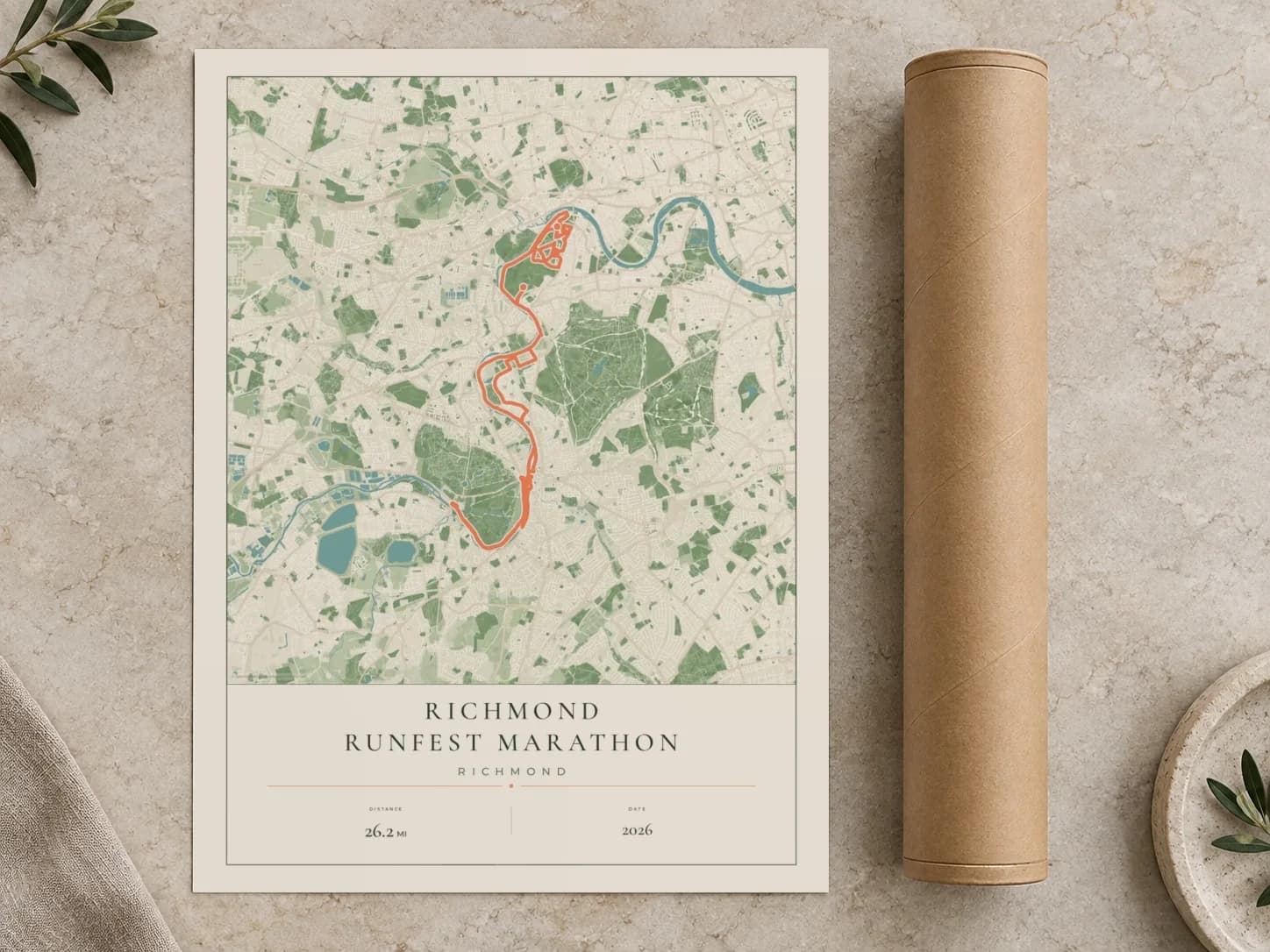 Cardboard postal tube beside a flat Richmond RUNFEST Marathon route print