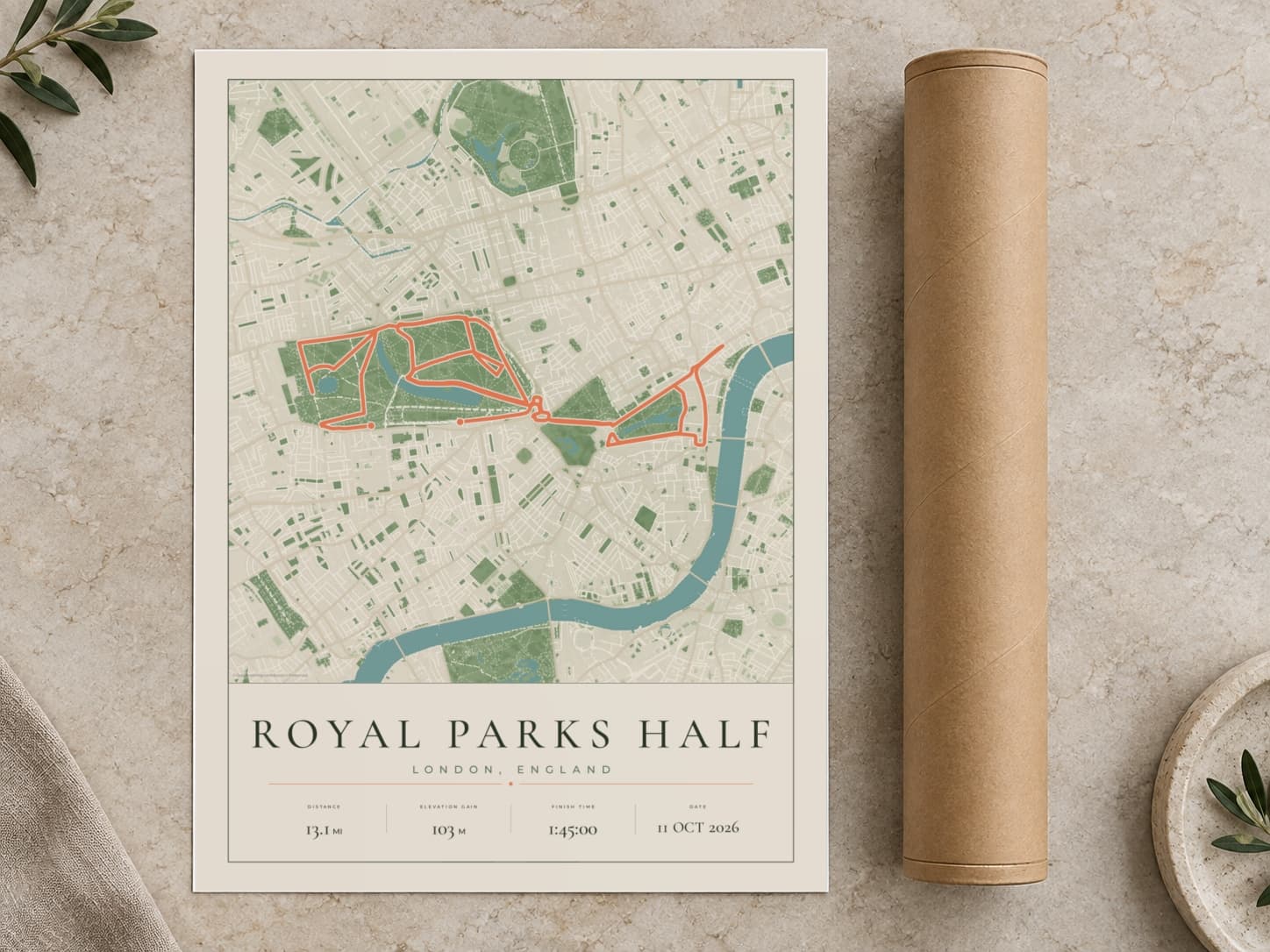 Cardboard postal tube beside a flat Royal Parks Half Marathon route print