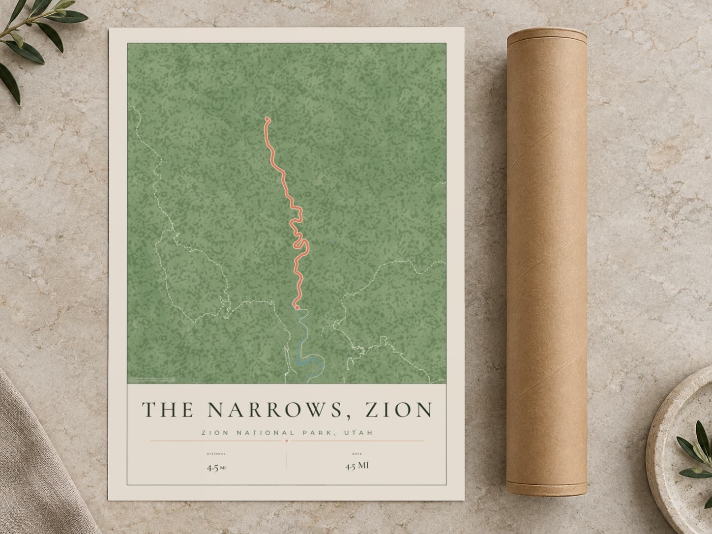 Cardboard postal tube beside a flat The Narrows, Zion route print
