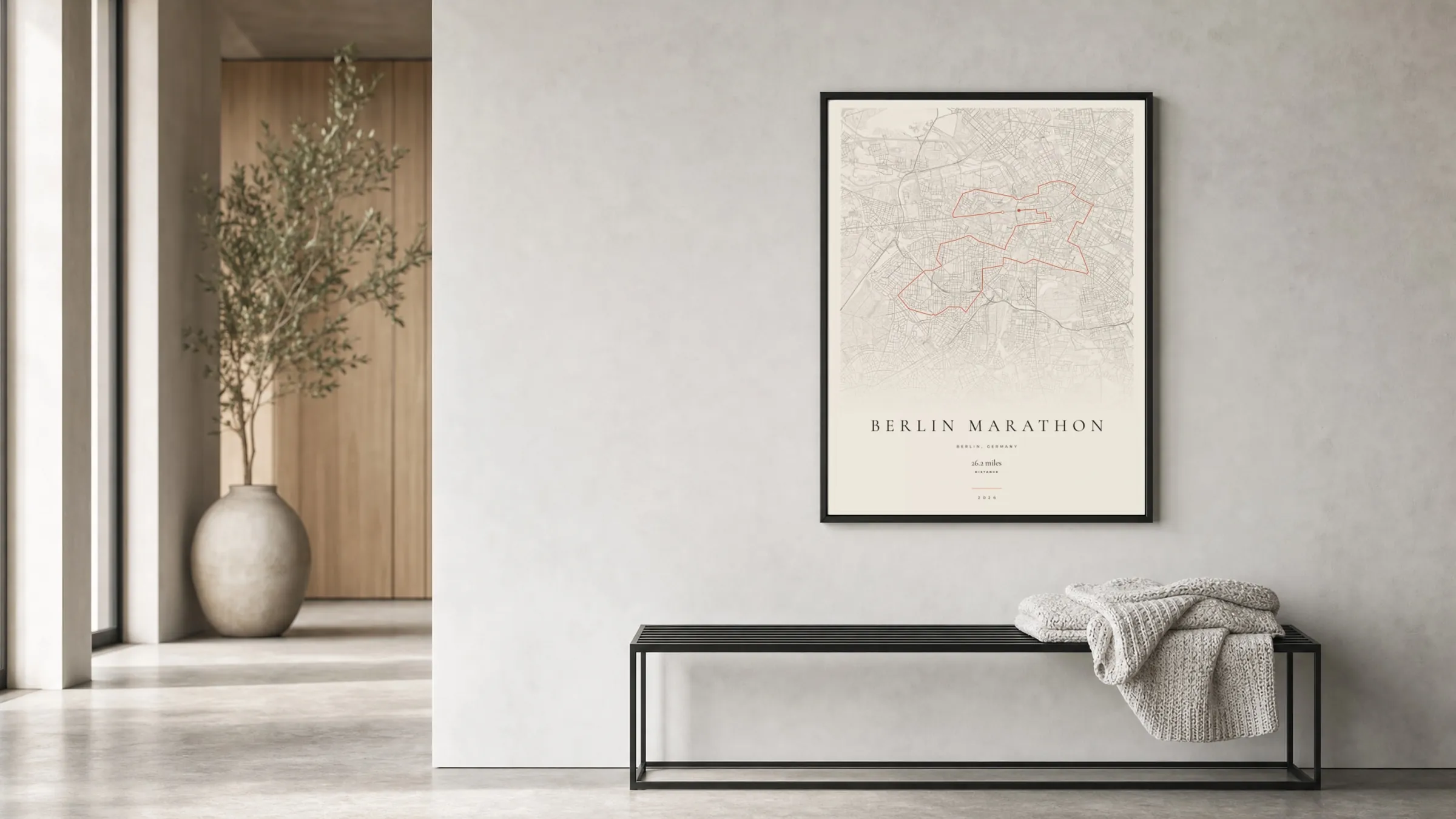 Berlin Marathon 2026 Gallery Mono route print in a black frame in a bright hallway
