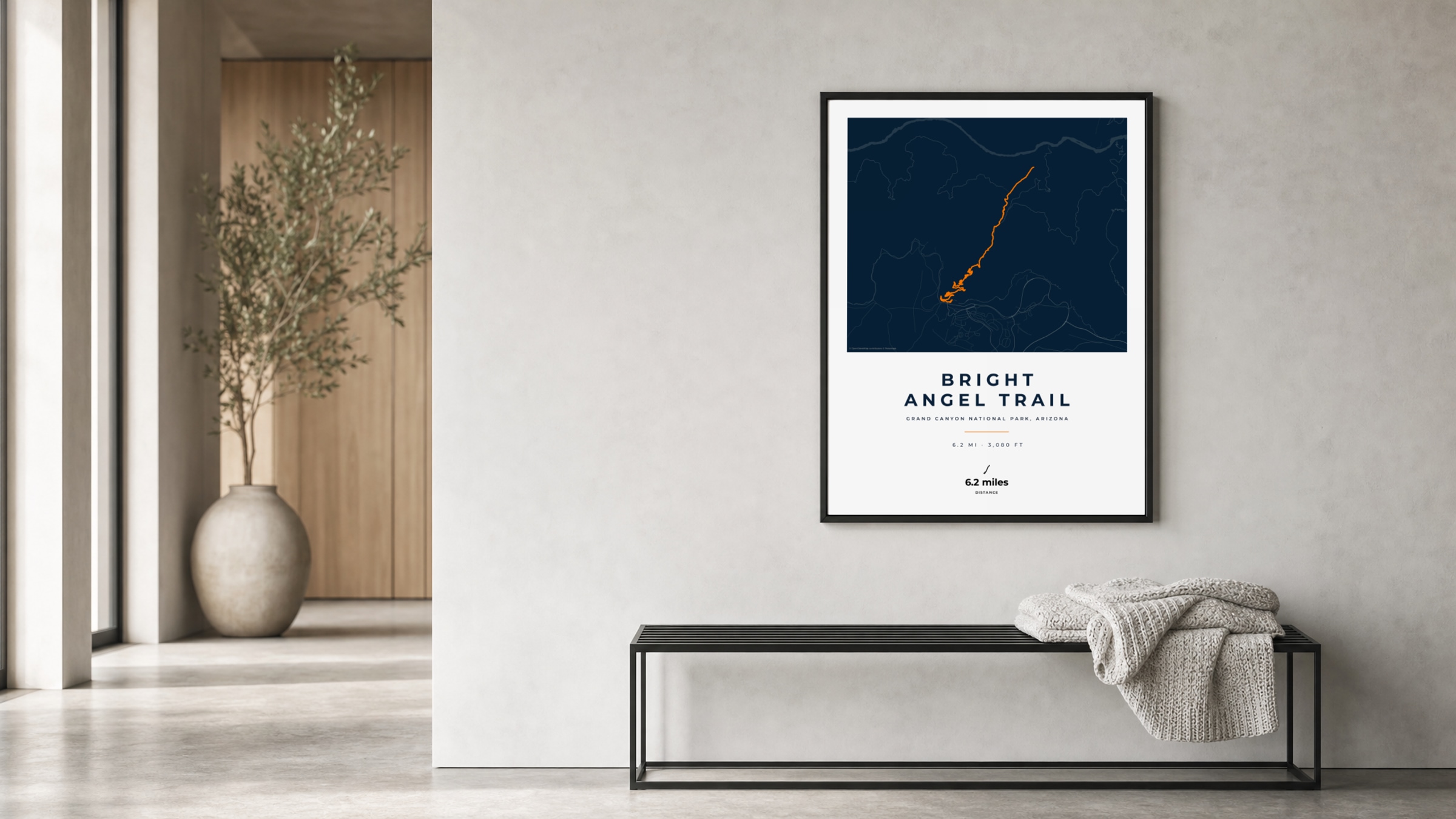 Bright Angel Trail Race Blueprint route print in a black frame in a bright hallway