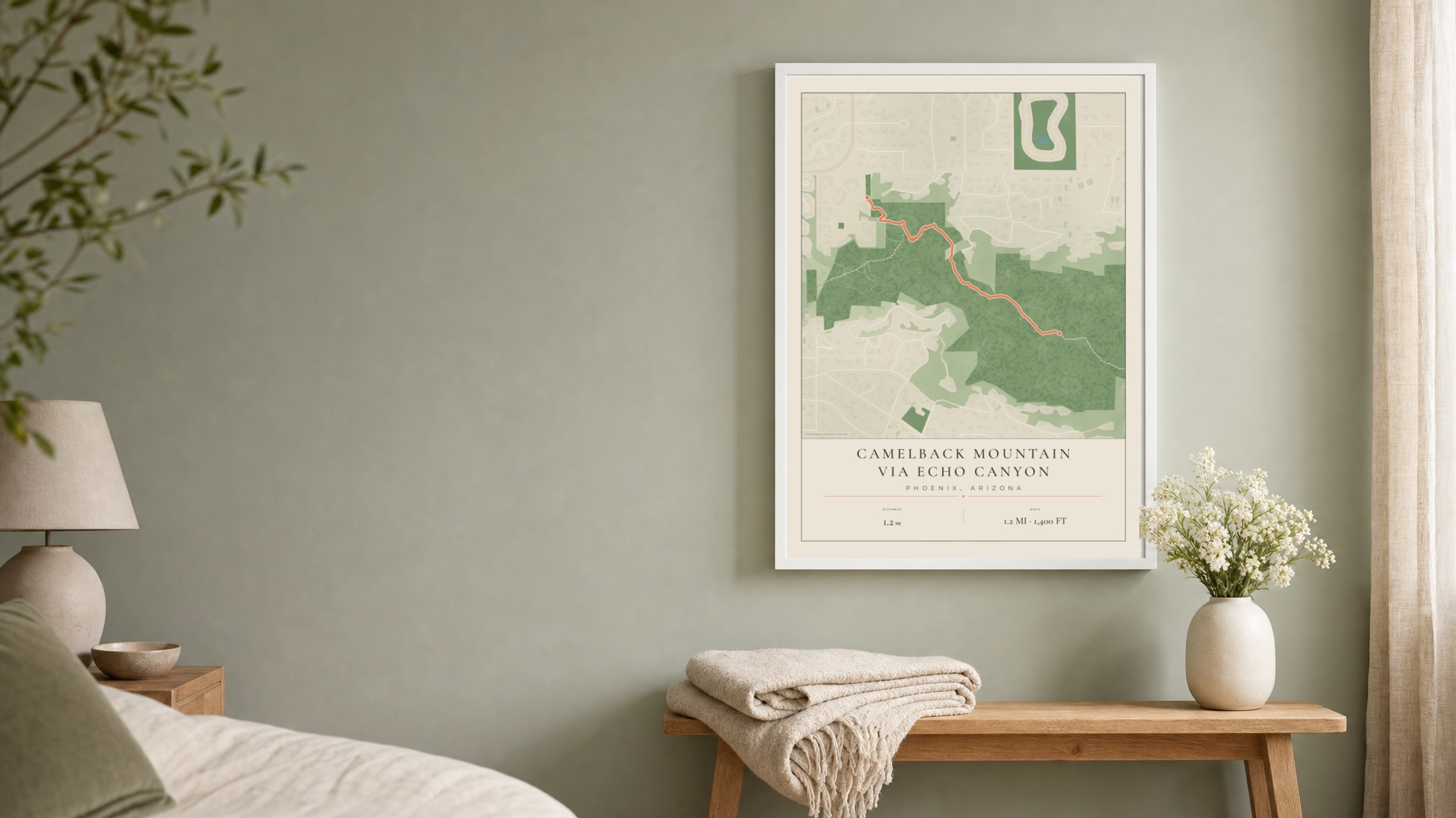 Camelback Mountain Parkland route print in a white frame on a sage bedroom wall