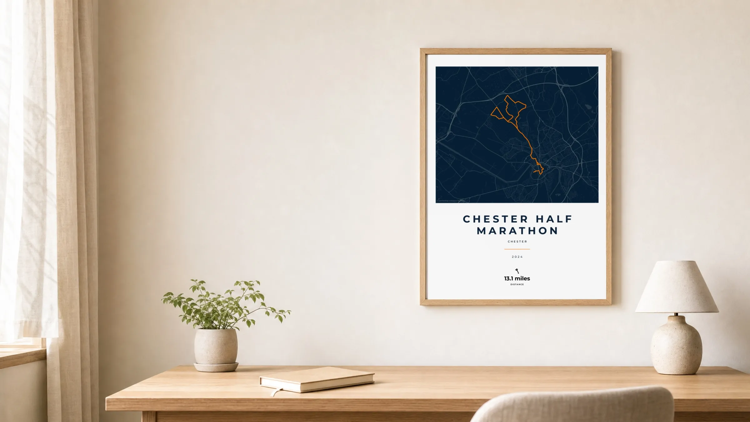 Chester Half Marathon 2024 Race Blueprint route print in an oak frame above a study desk