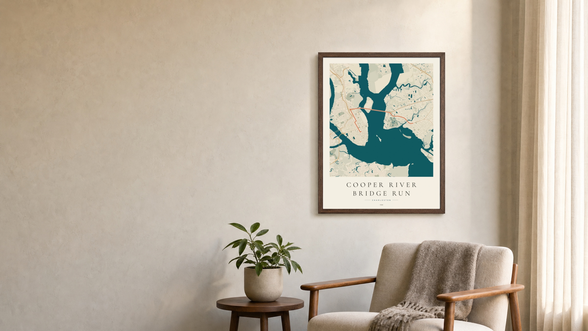 Cooper River Bridge Run 2025 Coastal Atlas route print in a dark walnut frame on a living-room wall