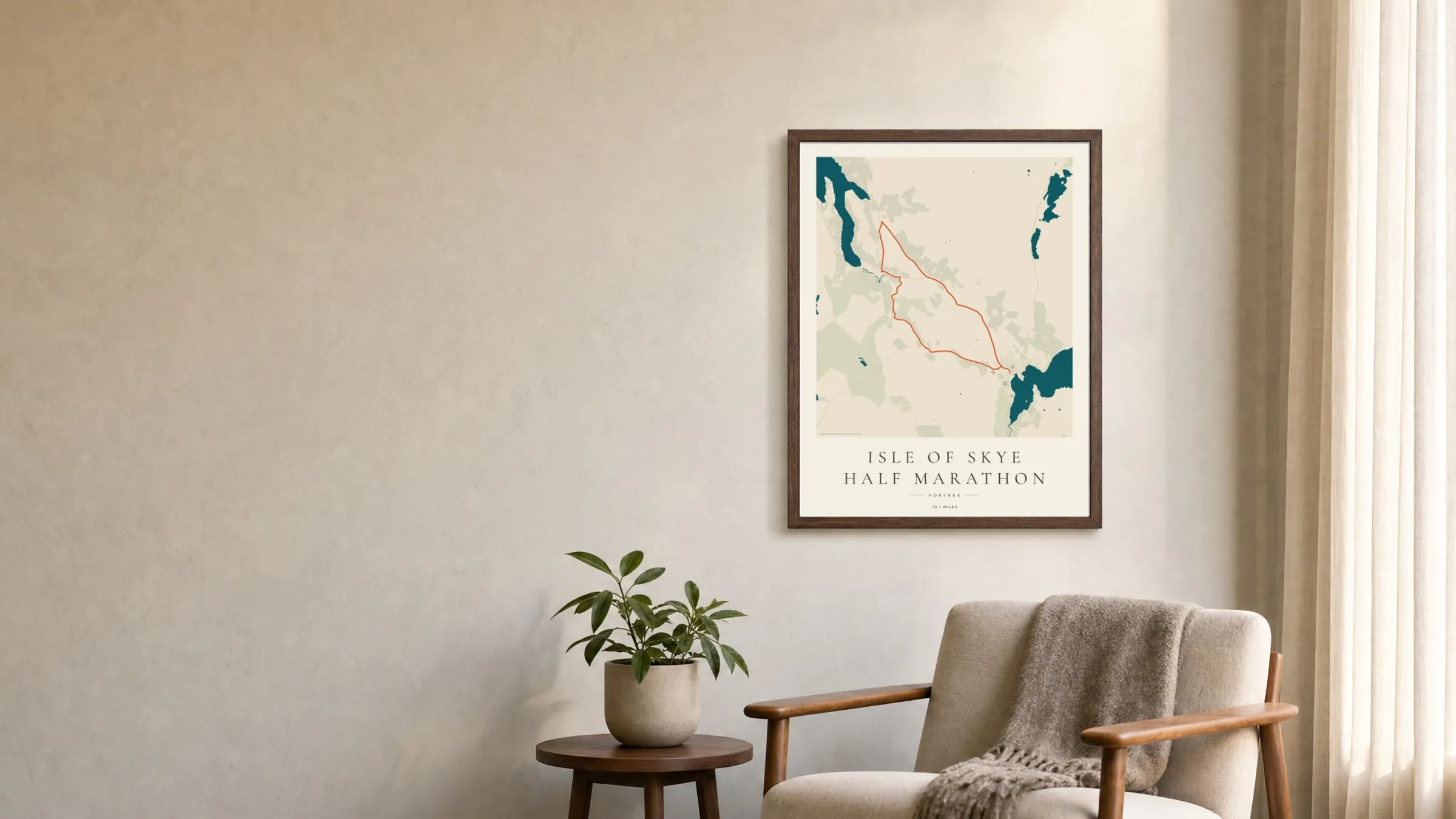 Isle of Skye Half Marathon 2025 Coastal Atlas route print in a dark walnut frame on a living-room wall