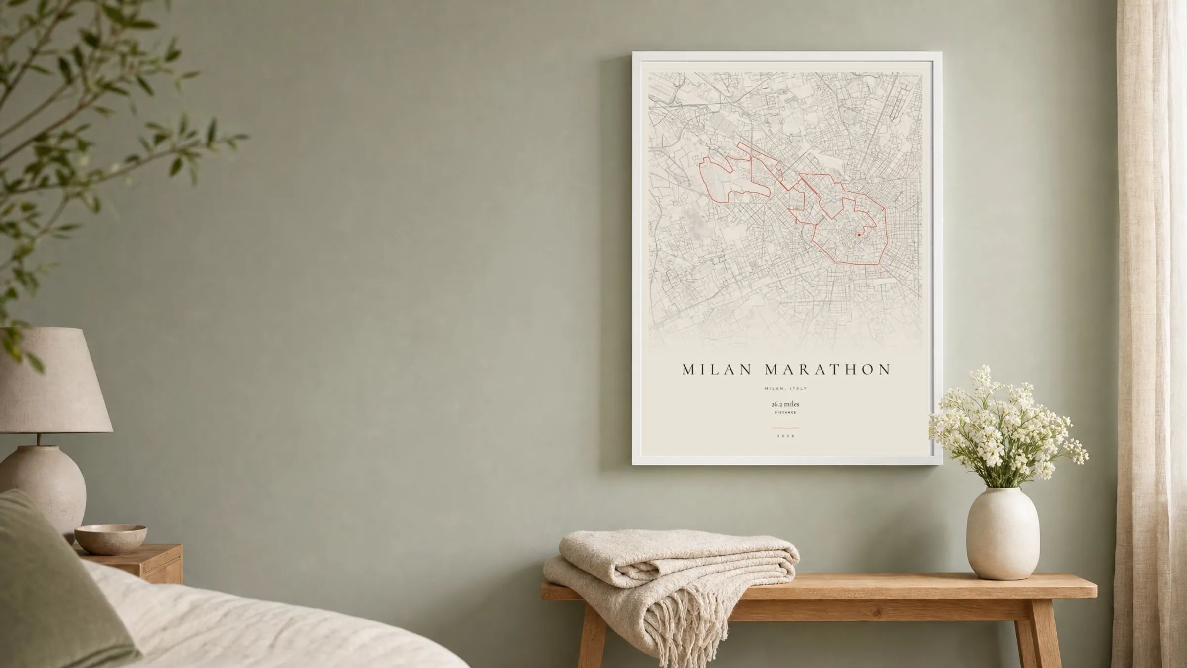 Milan Marathon 2026 Gallery Mono route print in a white frame on a sage bedroom wall