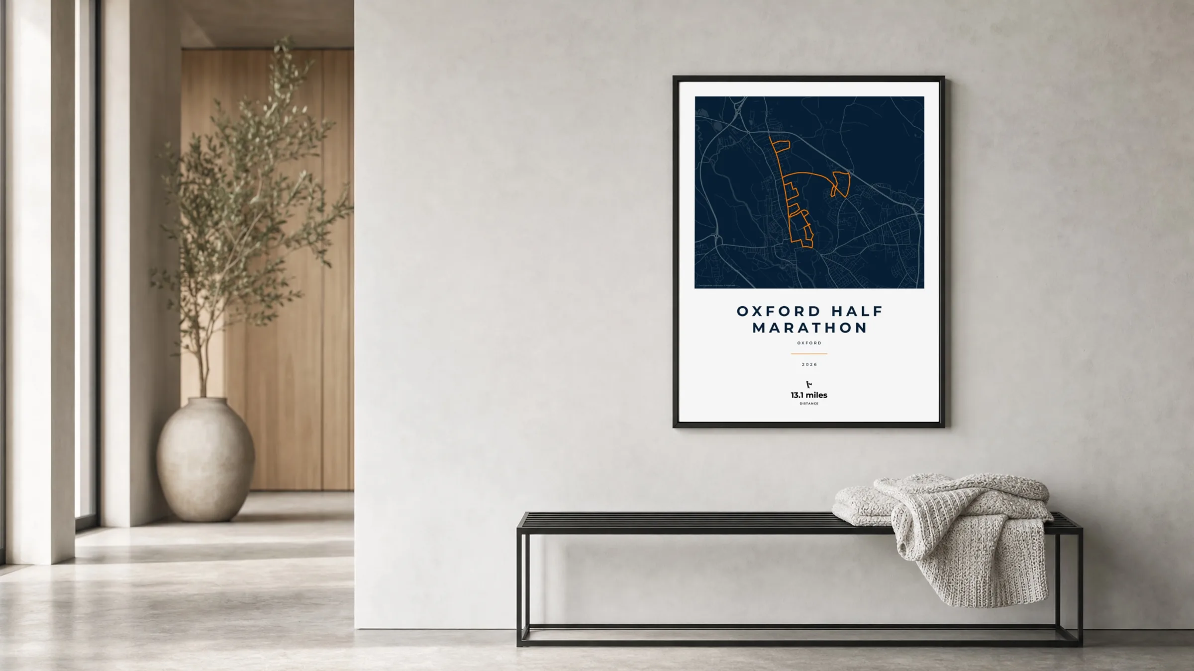 Oxford Half Marathon Race Blueprint route print in a black frame in a bright hallway
