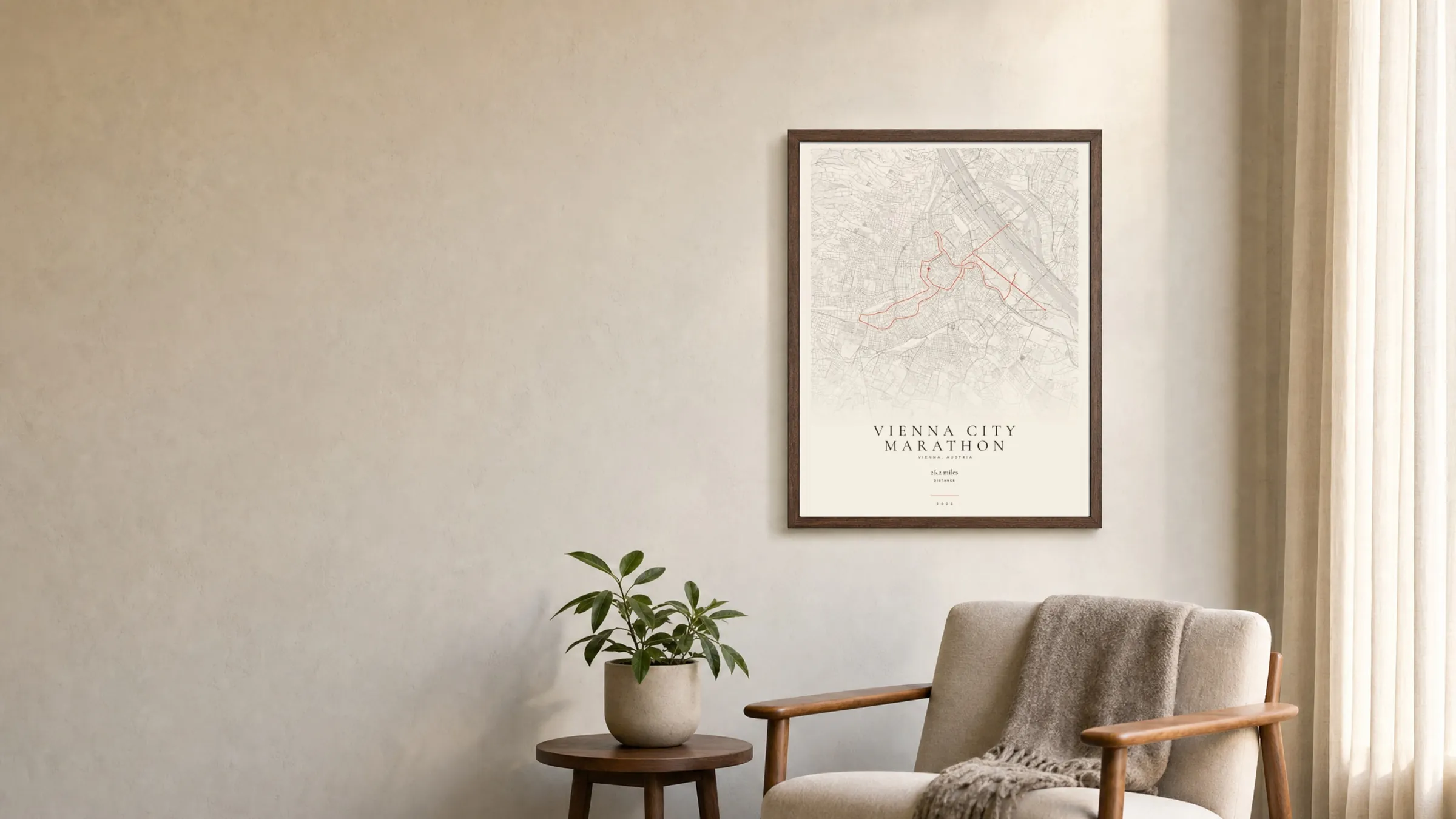 Vienna City Marathon 2026 Gallery Mono route print in a dark walnut frame on a living-room wall